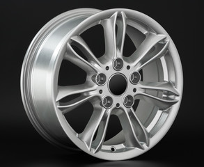 Obraz premium Aluminum metal wheel rim texture. Car alloy wheel, isolated on black background