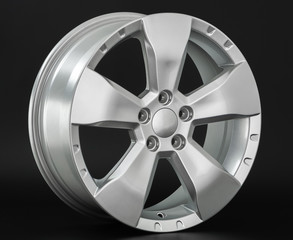 Obraz premium Aluminum metal wheel rim texture. Car alloy wheel, isolated on black background
