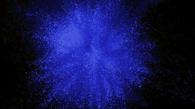 Blue powder exploding on black background in super slow motion, shot with Phantom Flex 4K