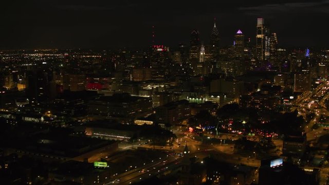 Philadelphia, Pennsylvania circa-2017, Night aerial view of downtown Philadelphia buildings.  Shot with Cineflex and RED Epic-W Helium. 