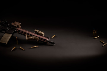 military wallpaper with an assault rifle on a black background