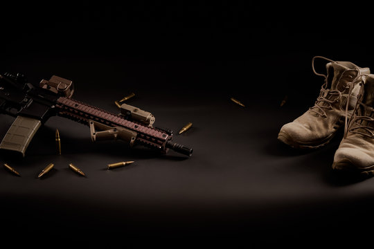 military wallpaper with an assault rifle on a black background