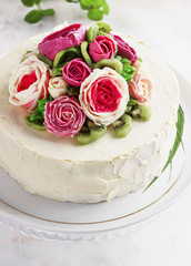 Birthday cake with flowers rose on white background