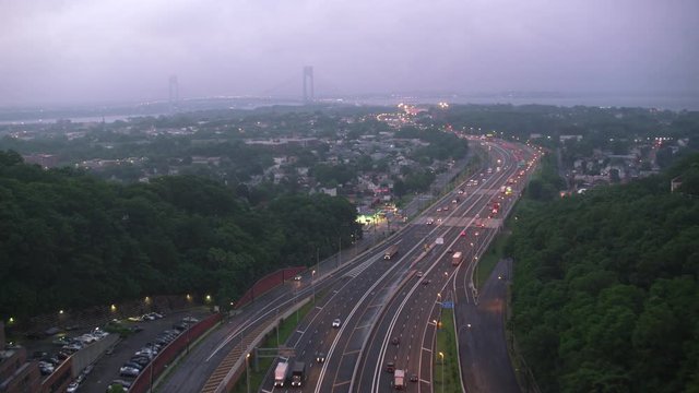 New York City circa-2017, Interstate 287 with Verrazano-Narrows Bridge in distance.  Shot with Cineflex and RED Epic-W Helium. 