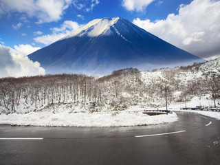 beautiful road in mountain with nice view of snow in Spring