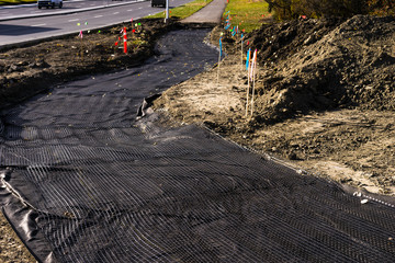 Geotextile and geonet  as road base