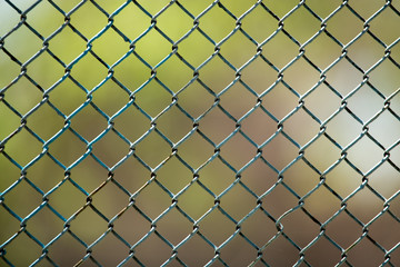 Metal mesh on the fence as a background