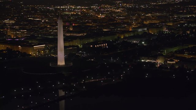 Washington, D.C. circa-2017, Aerial view of the Washington Monument and Capitol Mall area at night.   Shot with Cineflex and RED Epic-W Helium. 