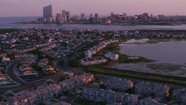 Atlantic City, New Jersey circa-2017, Aerial view of homes with Atlantic City in distance.  Shot with Cineflex and RED Epic-W Helium. 