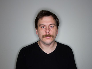 Obraz premium mustached man with a blank face