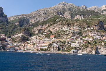 Fototapeta na wymiar Panorama of Positano with houses climbing up the hill, Campania, Italy