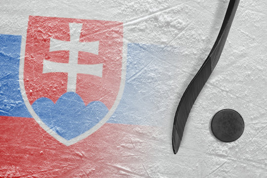 Image of Slovak flag and hockey stick with puck