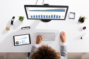Businesswoman Analyzing Graph