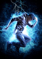 Man break dancing on electricity light background
