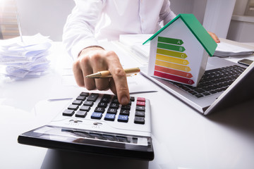 Businessman Calculating Financial Data