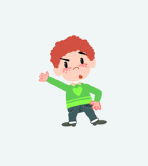 White boy in jeans something angry shows something to his right.