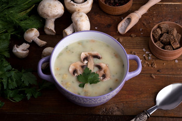 Mushroom soup on a wooden table