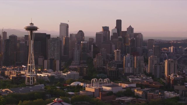 Seattle, Washington circa-2017, Aerial view of Seattle at sunrise with Space Needle and Mt. Rainier.  Shot with Cineflex and RED Epic-W Helium. 