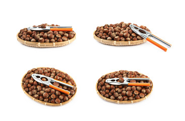 Wicker basket of hazelnuts isolated