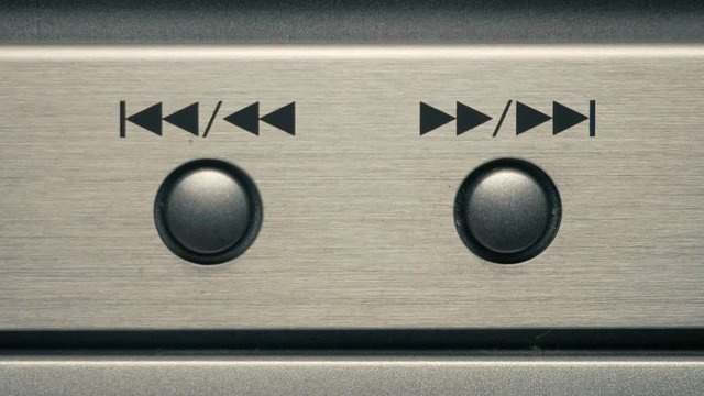 The man push the rewind button. Closeup