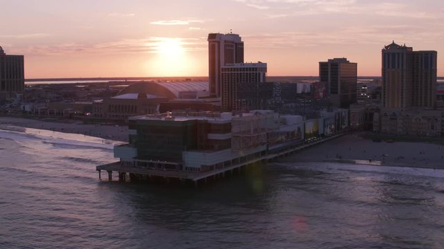 Atlantic City, New Jersey circa-2017, Aerial view of sun setting over Atlantic City.   Shot with Cineflex and RED Epic-W Helium. 