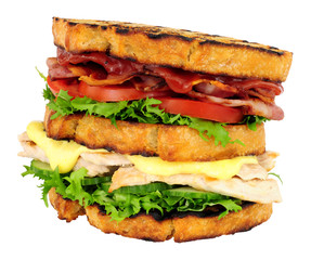 Chicken and bacon double decker sandwich isolated on a white background