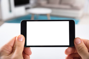 Human Hand Using Mobile Phone