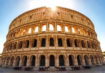 Fototapeta na wymiar Colosseum in Rome, Italy. The biggest amphitheater of Ancient Rome.