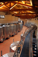 Italia, Toscana, Arezzo, il villaggio de Il Borro,un cantina, botti in acciaio per vino.