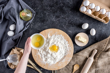 cropped shot of woman mixing ingredients for bread