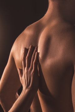 Cropped View Of Woman Touching Back Of Her Lover, Isolated On Brown