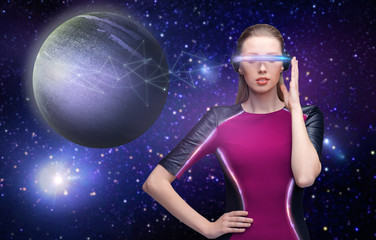 Fototapeta na wymiar woman in virtual reality glasses over space