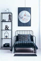 Moon poster in bedroom interior