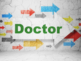Medicine concept:  arrow with Doctor on grunge textured concrete wall background, 3D rendering
