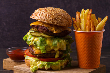 Scrumptious beef burger with fries