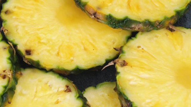Pineapple slices platter rotating, 4K 