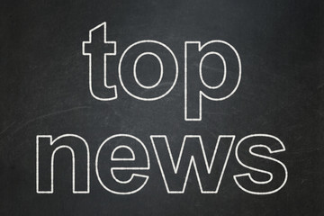 Obraz premium News concept: text Top News on Black chalkboard background