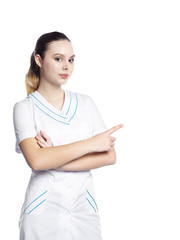 A beautiful girl in a medical robe shows.