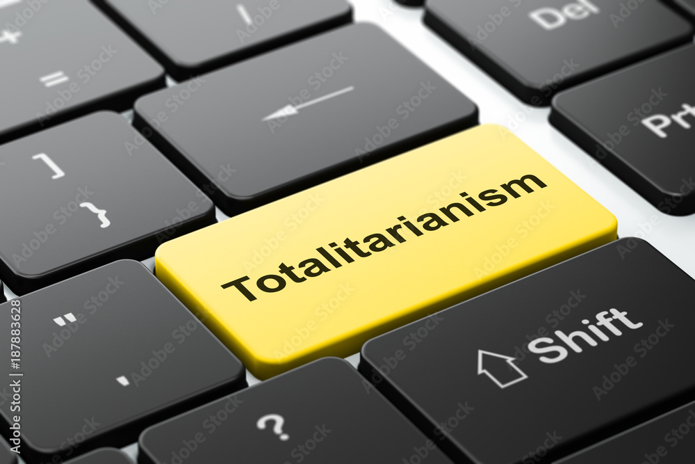 Aufkleber political concept: computer keyboard with word totalitarianism, selected focus on enter button backg
