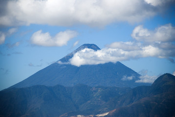 Fototapeta premium Stunning view of volcano in Guatemala called Agua. 3,760 m. Central America. Nature reserve attractive landscape tourism.