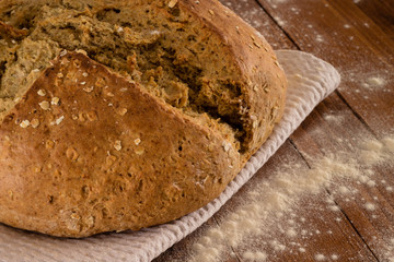 Traditional Irish Soda Bread Made For St. Patrick's Day Served On Floured Wooden Table