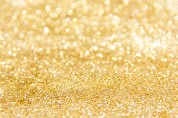 gold glitter defocused texture background. gold christmas abstract background