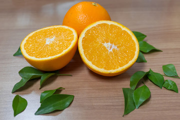 Oranges healthy fruit is placed on wooden floor.