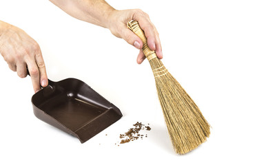 Small hand broom for household cleaning on the white