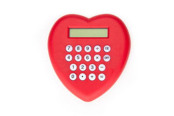 Red, heart shaped calculator, isolated on white.