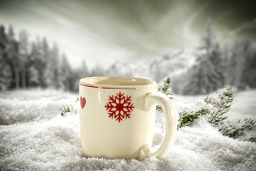 Obraz na płótnie Canvas mug in snow and winter time 