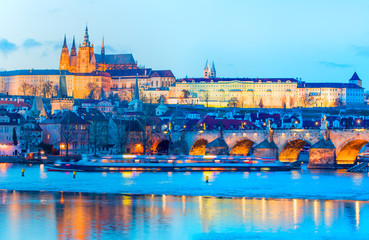 Fototapeta premium Prague Castle and Charles Bridge, Prague, Czech Republic, Vltava river in foreground