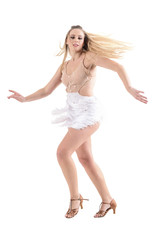 Naklejka premium Stopped action motion of skillful professional female dancer with flowing hair and dress. Full body length portrait isolated on white background. 