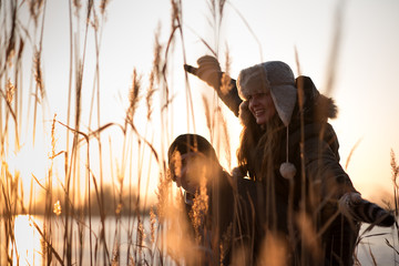 Cheerful woman enjoying piggyback ride