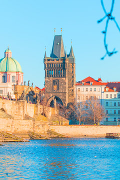 View of Charles Bridge and Lesser Bridge Tower in Prague, Czech Republic